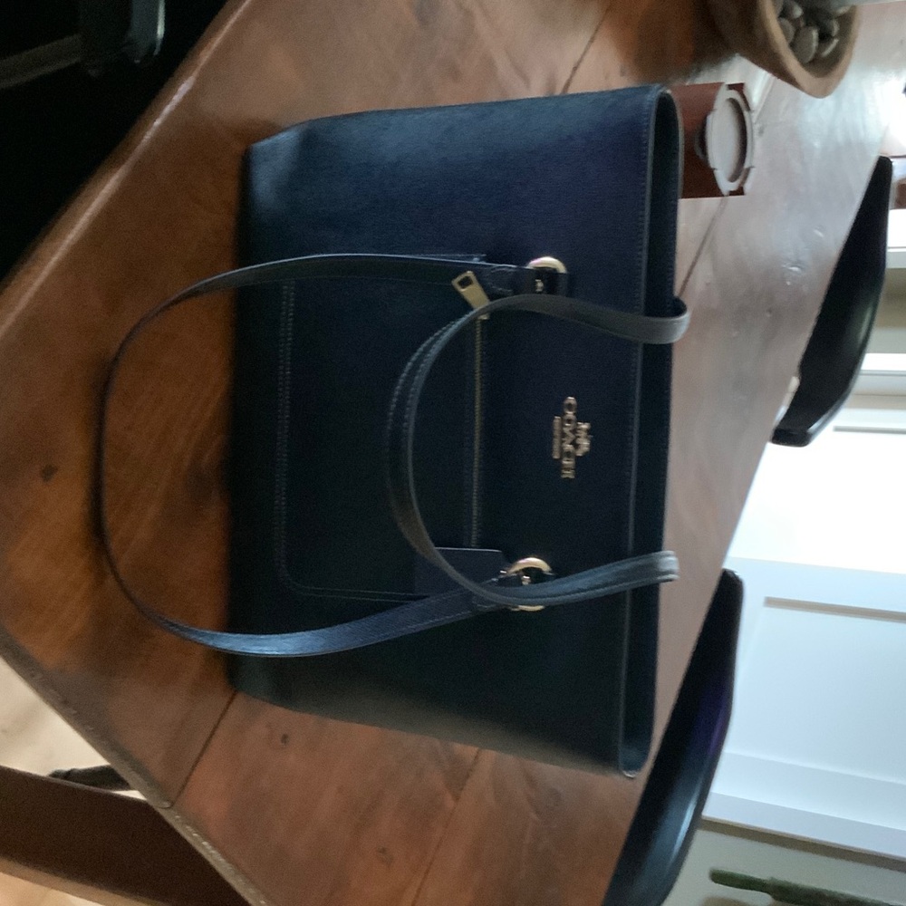 Coach black “Station” Leather Tote